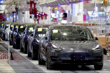 FILE PHOTO: Tesla’s China-made Model 3 vehicles are seen during