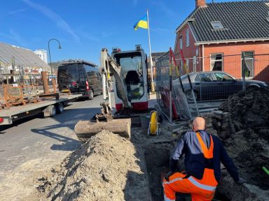 Workers rebuild homes in the northern Dutch town of Overschild,