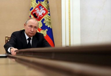 FILE PHOTO: Russian President Vladimir Putin attends a meeting with