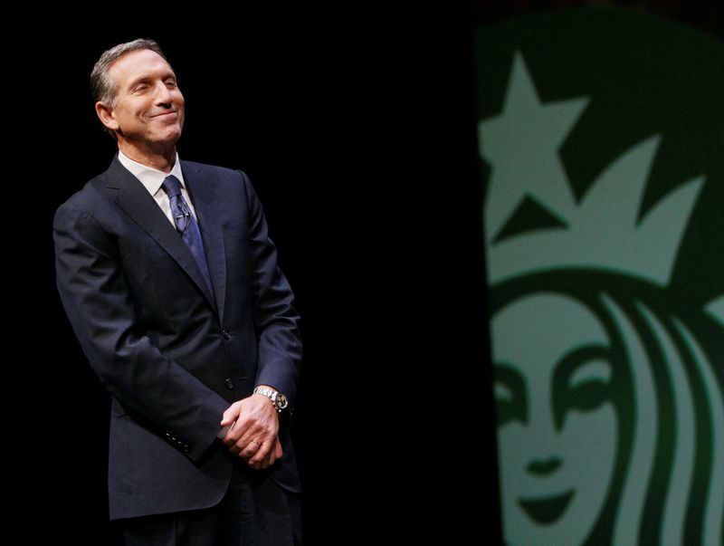 FILE PHOTO: Starbucks Chairman and CEO Schultz looks on during
