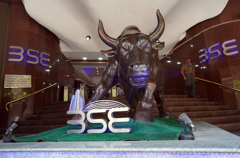 A man walks out of the Bombay Stock Exchange building