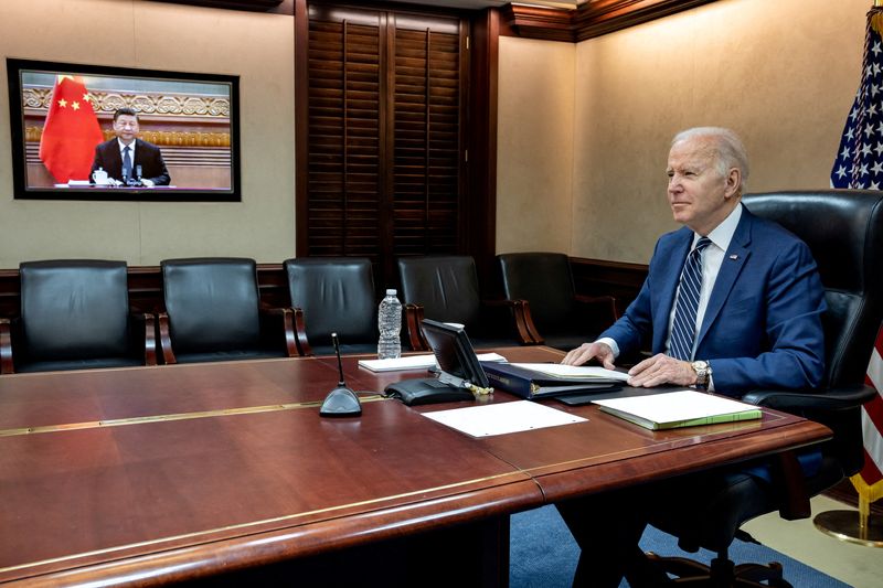 FILE PHOTO: U.S. President Joe Biden speaks by video with