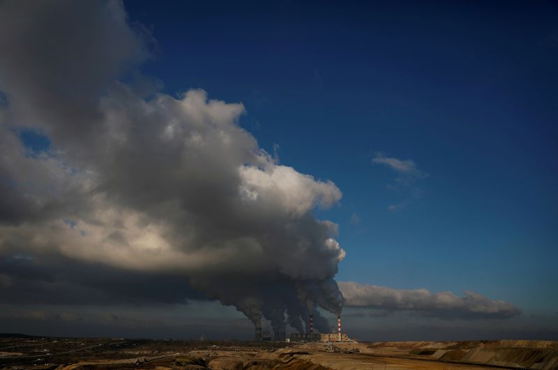 FILE PHOTO: Smoke and steam billows from Belchatow Power Station,
