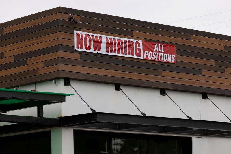 FILE PHOTO: A restaurant advertising jobs looks to attract workers