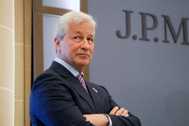 FILE PHOTO: JP Morgan CEO Jamie Dimon looks on during