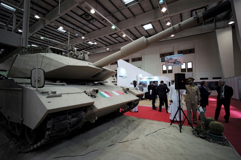 FILE PHOTO: Visitors are seen next to Leonardo’s M60A3 tank