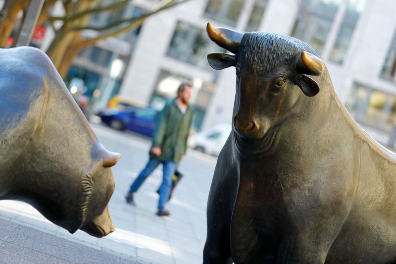 FILE PHOTO: Bull and bear statues outside the stock exchange