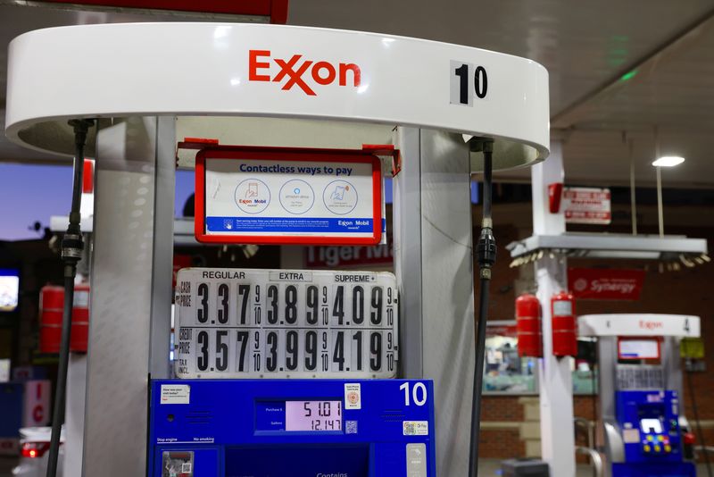 Signage is seen on a gasoline pump at an Exxon