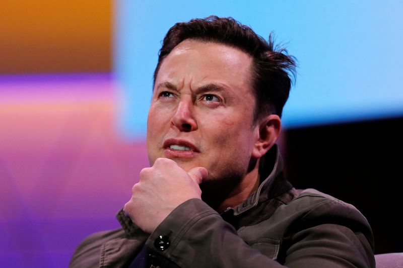 FILE PHOTO: SpaceX owner and Tesla CEO Elon Musk gestures