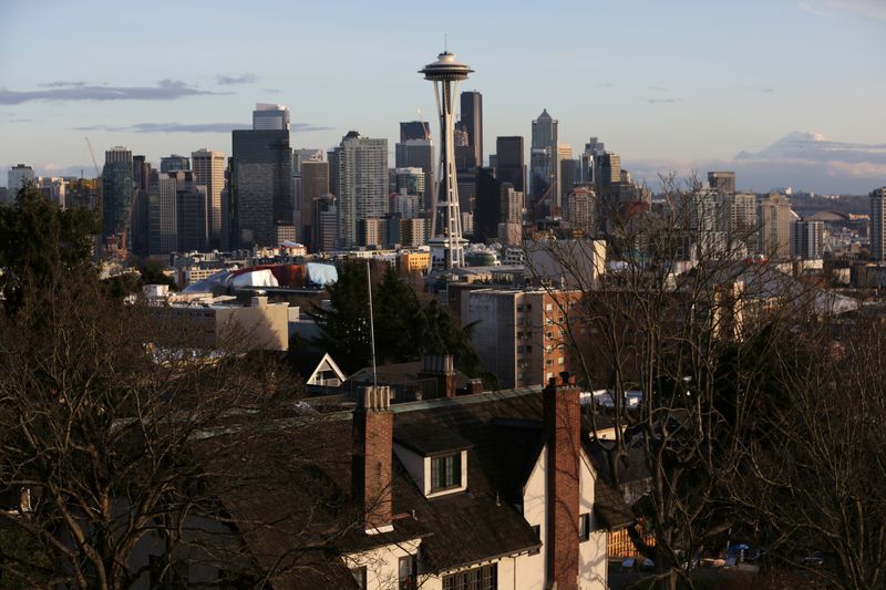 The Space Needle and Mount Rainier are seen on the
