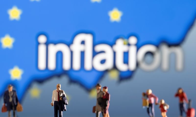 Illustration shows small figurines, displayed word “Inflation”, EU flag and