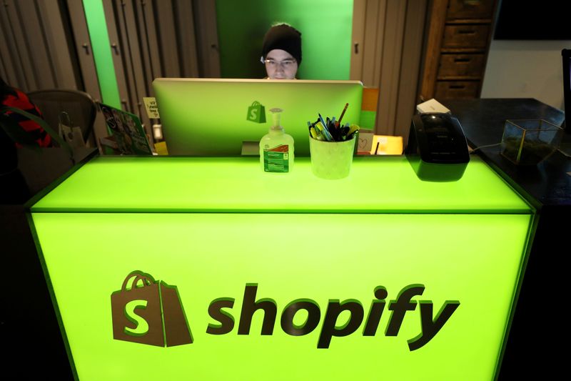 FILE PHOTO: An employee works at Shopify’s headquarters in Ottawa