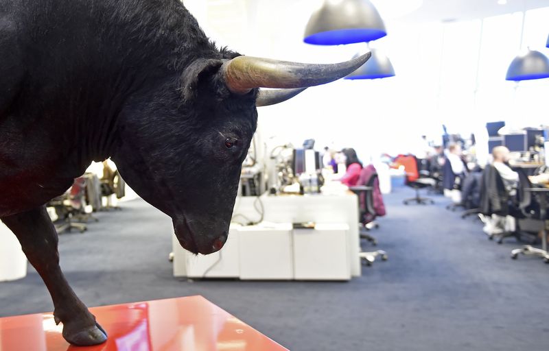 FILE PHOTO: A bull statue is pictured in an office