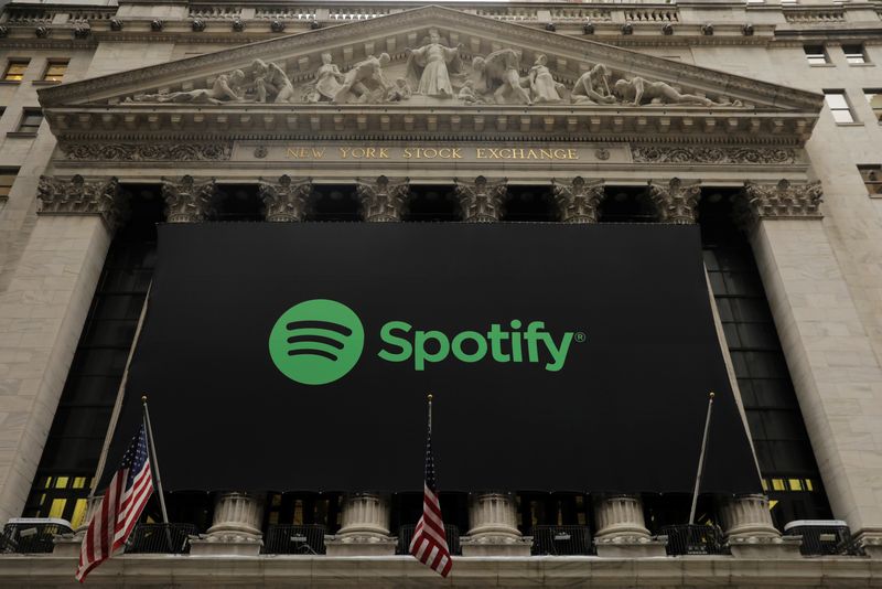 FILE PHOTO: The Spotify logo hangs on the facade of