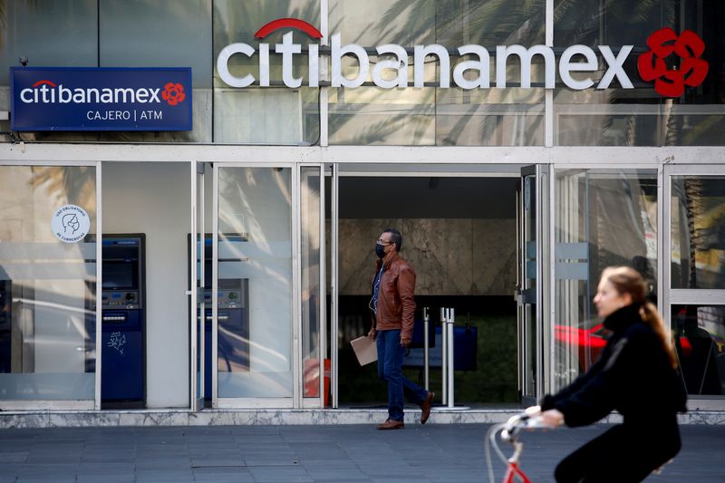 FILE PHOTO: A man exits a Citibanamex bank branch in