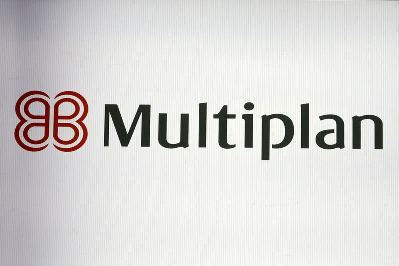 The company logo for Multiplan is displayed on a screen