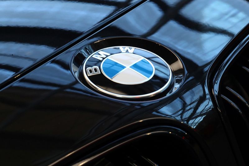 A logo of German luxury carmaker BMW, is seen ahead