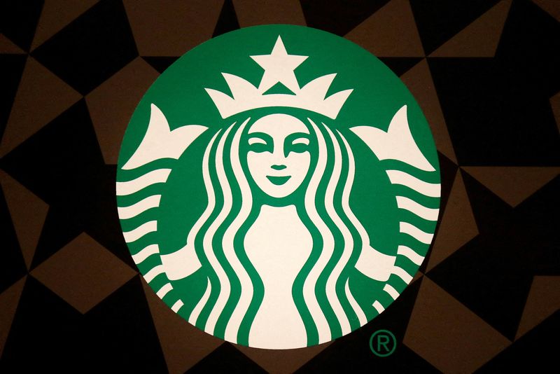 FILE PHOTO: FILE PHOTO: A Starbucks logo is pictured on