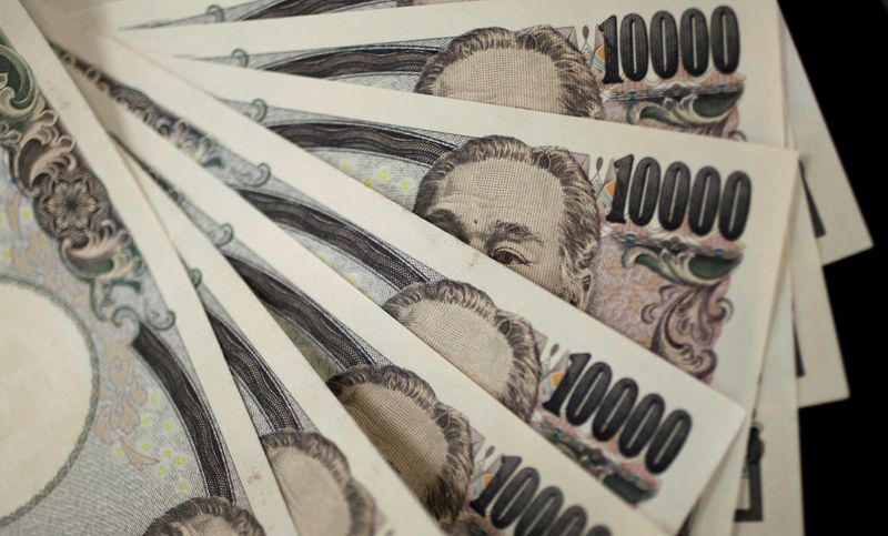 FILE PHOTO: A picture illustration shows Japanese 10,000 yen notes