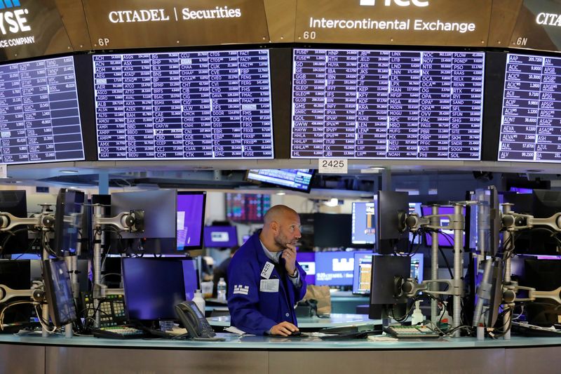 FILE PHOTO: A trader works on the trading floor at