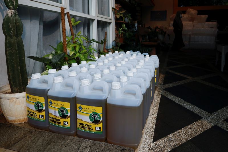 Containers with cooking oil to be distributed to residents are