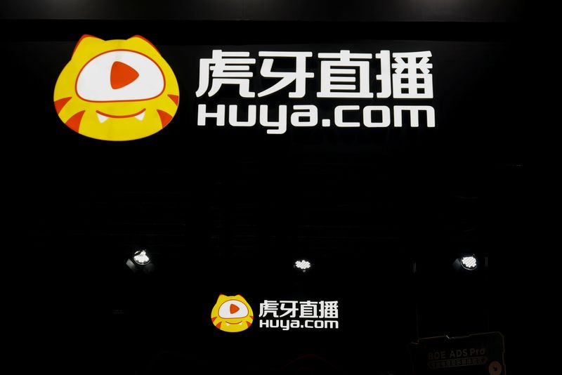 Signs of video game streaming site Huya are seen at