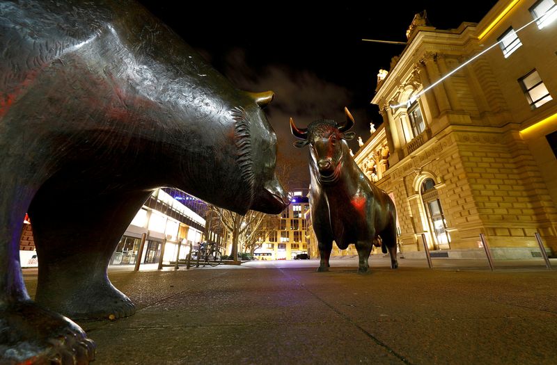 FILE PHOTO: Bull and bear symbols are seen in front
