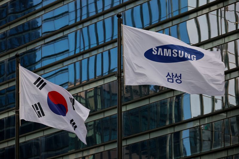FILE PHOTO: A flag bearing the logo of Samsung flutters