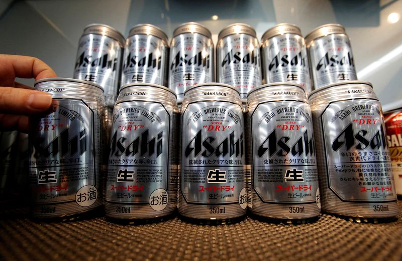 FILE PHOTO: Asahi Super Dry beer cans are displayed at