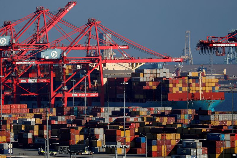 FILE PHOTO: Ships and shipping containers are pictured at the