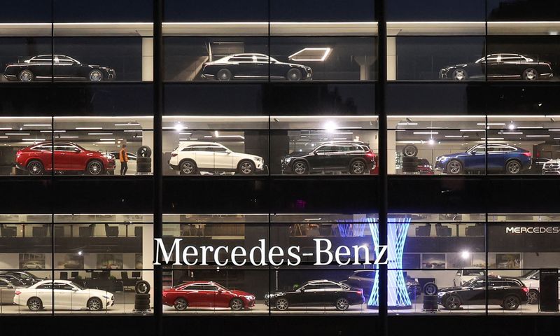 Mercedes-Benz cars are on display for sale at a showroom