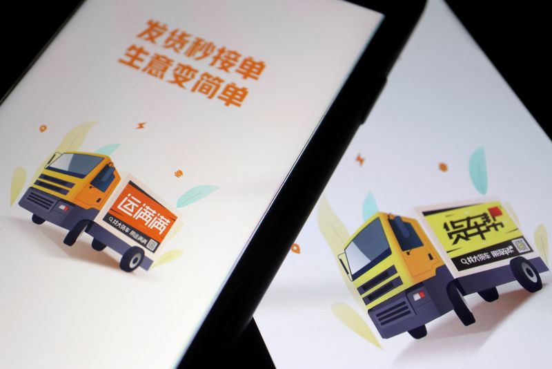 FILE PHOTO: Illustration picture of Chinese truck-hailing apps Huochebang and