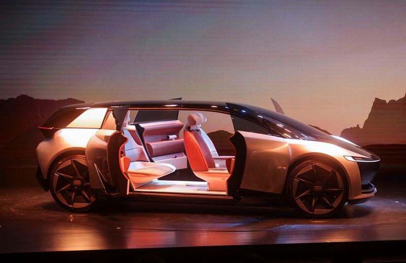The Tata Avinya concept car is unveiled during a global