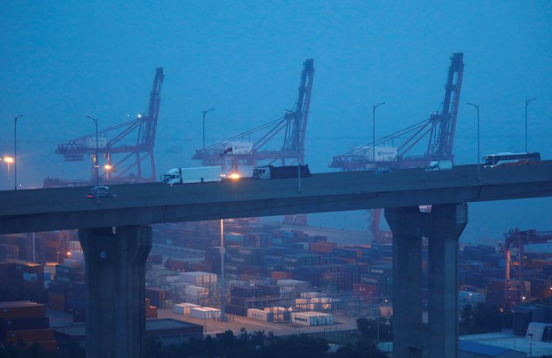 Cranes and shipping containers are seen at Pyeongtaek port in