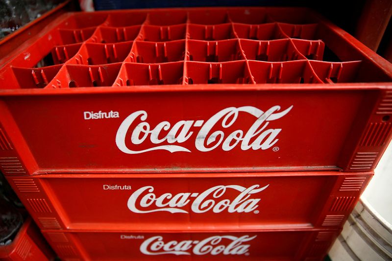 FILE PHOTO: Empty Coca-Cola cases are seen at a food