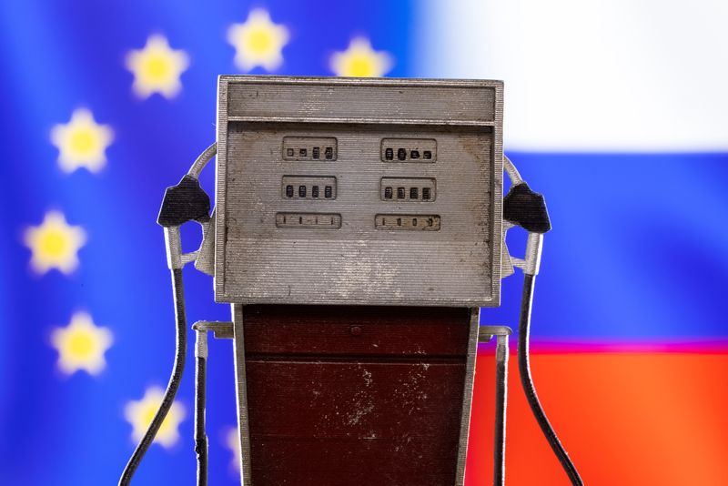 Illustration shows model of petrol pump, EU and Russian flag