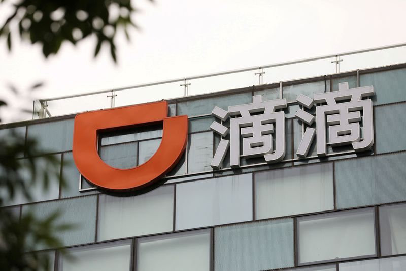 FILE PHOTO: Didi, Lenovo founders go private on China social