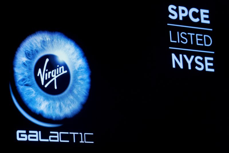 Virgin Galactic (SPCE) logo is displayed on a screen on
