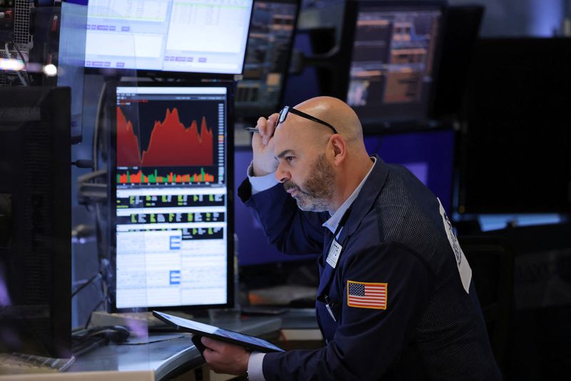A trader works on the trading floor at the New