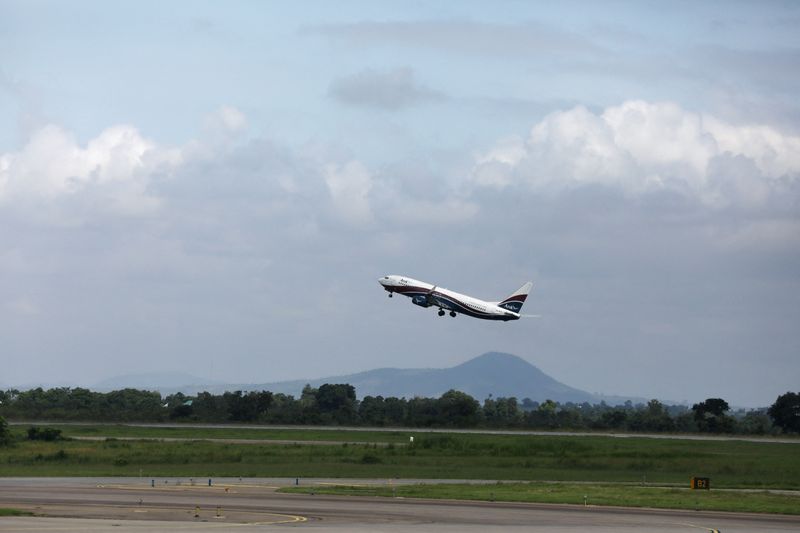 FILE PHOTO: An Arik airline flight takes off from the
