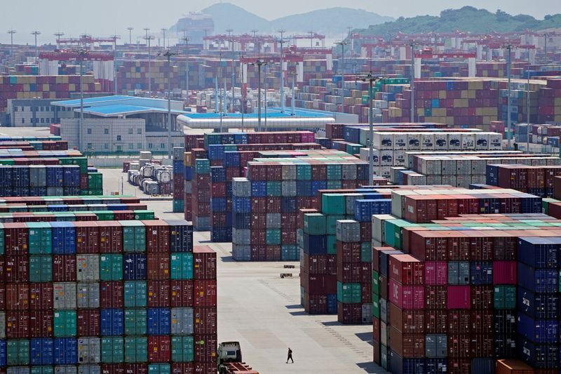 Containers are seen at the Yangshan Deep Water Port in
