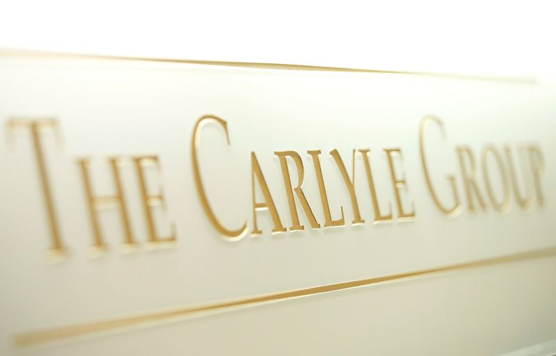 FILE PHOTO: The logo of The Carlyle Group is displayed