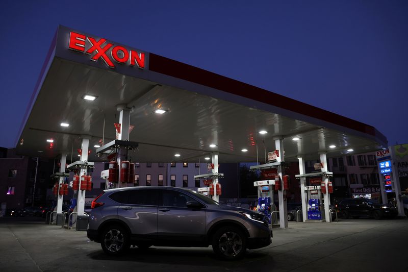 FILE PHOTO: Cars are seen at an Exxon gas station