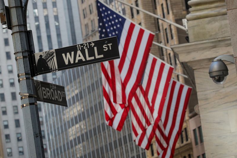 A Wall St. sign is seen outside the NYSE in