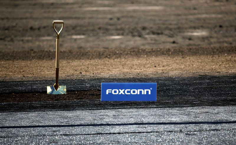Shovel and FoxConn logo are seen before the arrival of