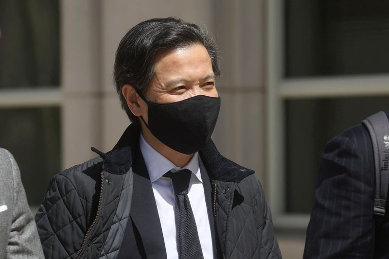FILE PHOTO: Ex-Goldman Sachs banker Roger Ng exits the United