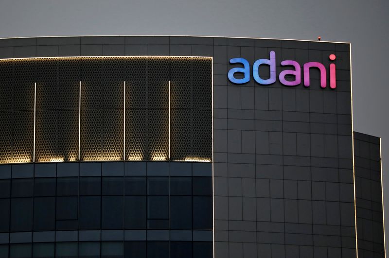 The logo of the Adani Group is seen on the
