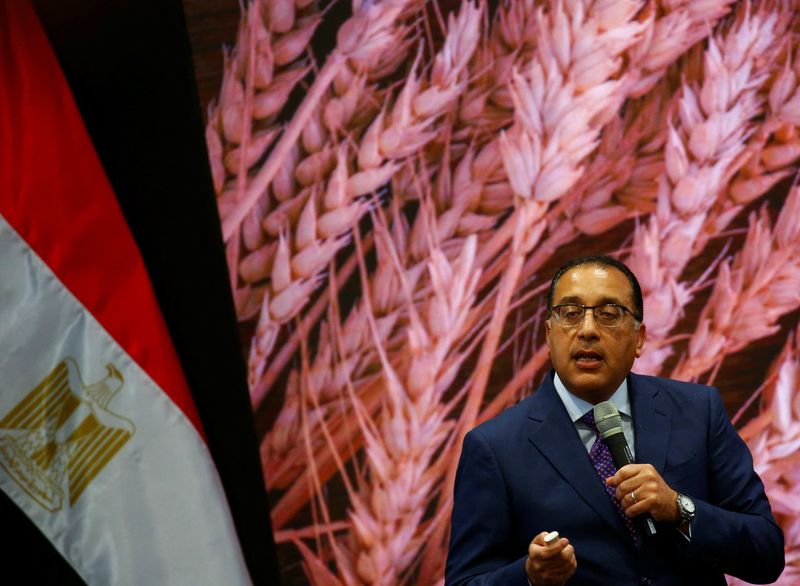 Egypt’s PM attends a news conference to announce the Egyptian