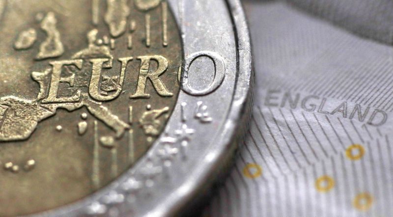 A two Euro coin is pictured next to an English