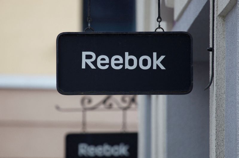 FILE PHOTO: Boards with Reebok store logo are seen on